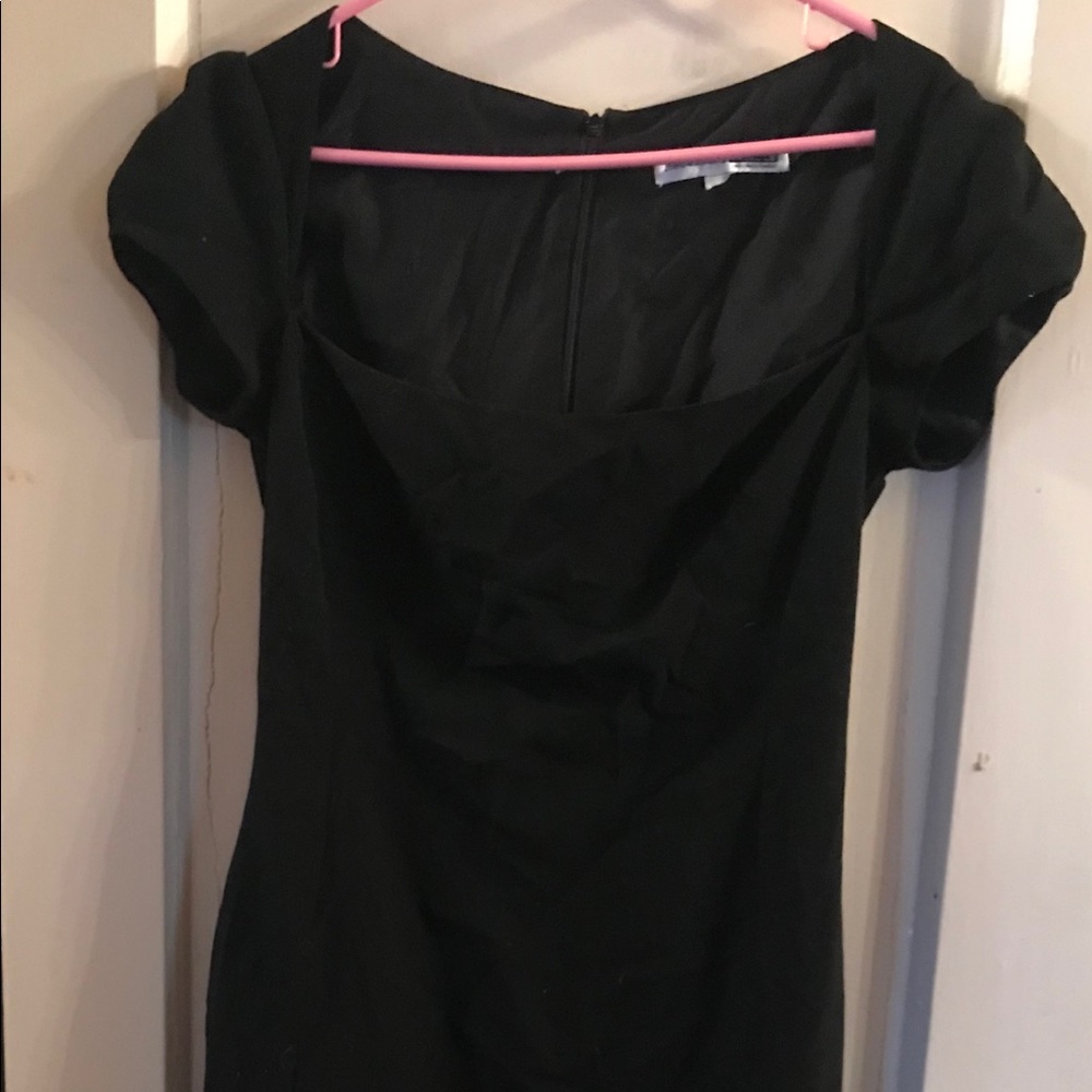 Women classic little black dress.